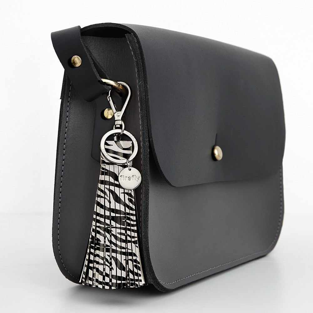 Produktbild 2 - Firefly Reflex Soft Tassel Reflector Zebra Print