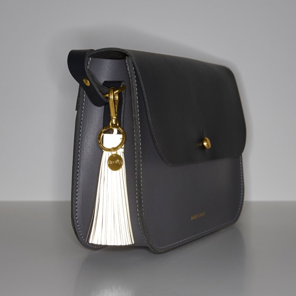 Firefly Reflex Soft Tassel Reflector Dark Denim Gold